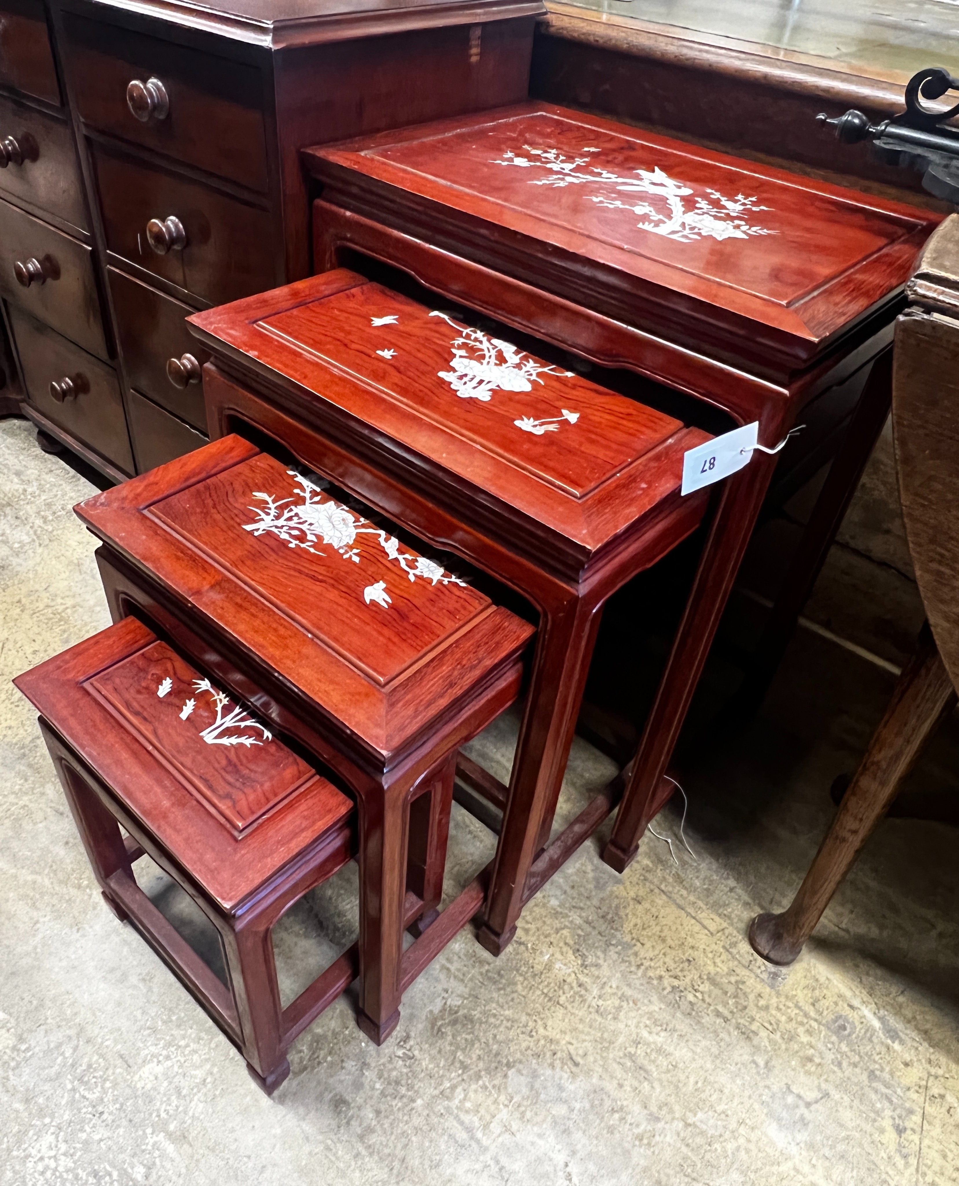 A quartetto of Chinese mother-of-pearl inlaid rectangular hardwood tea tables, width 50cm, depth 36cm, height 67cm
